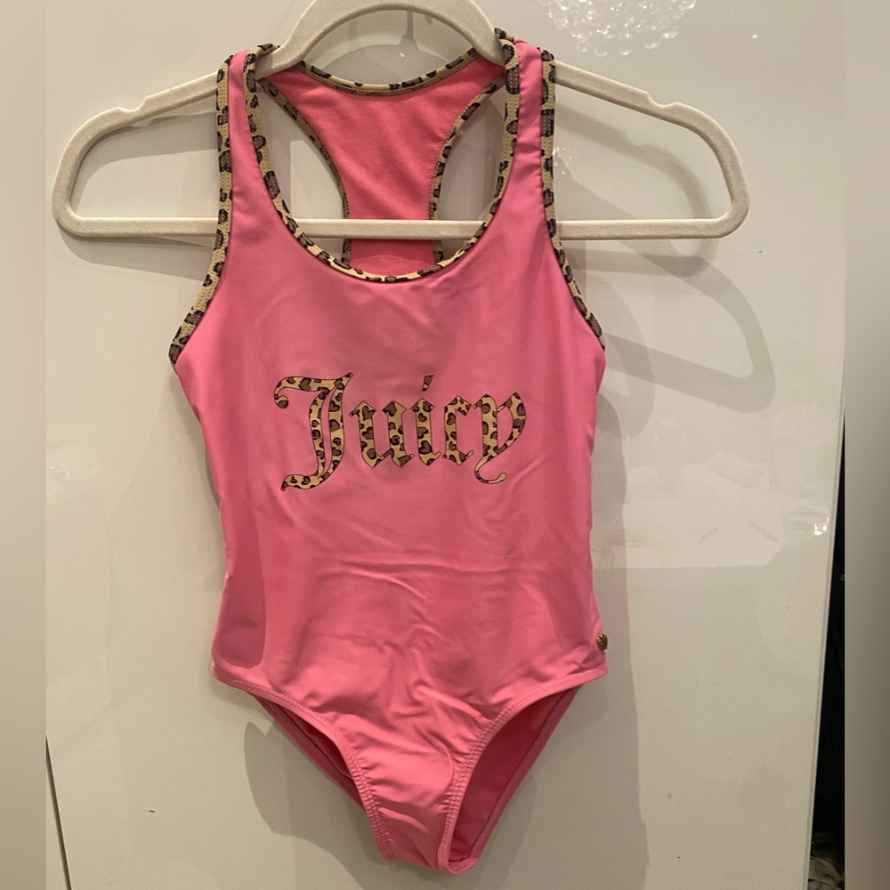 Authentic Juicy Couture girls one piece bathing suit in great condition.